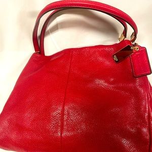 Newish beautiful red Coach bag.